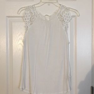 White sleeveless blouse with lace